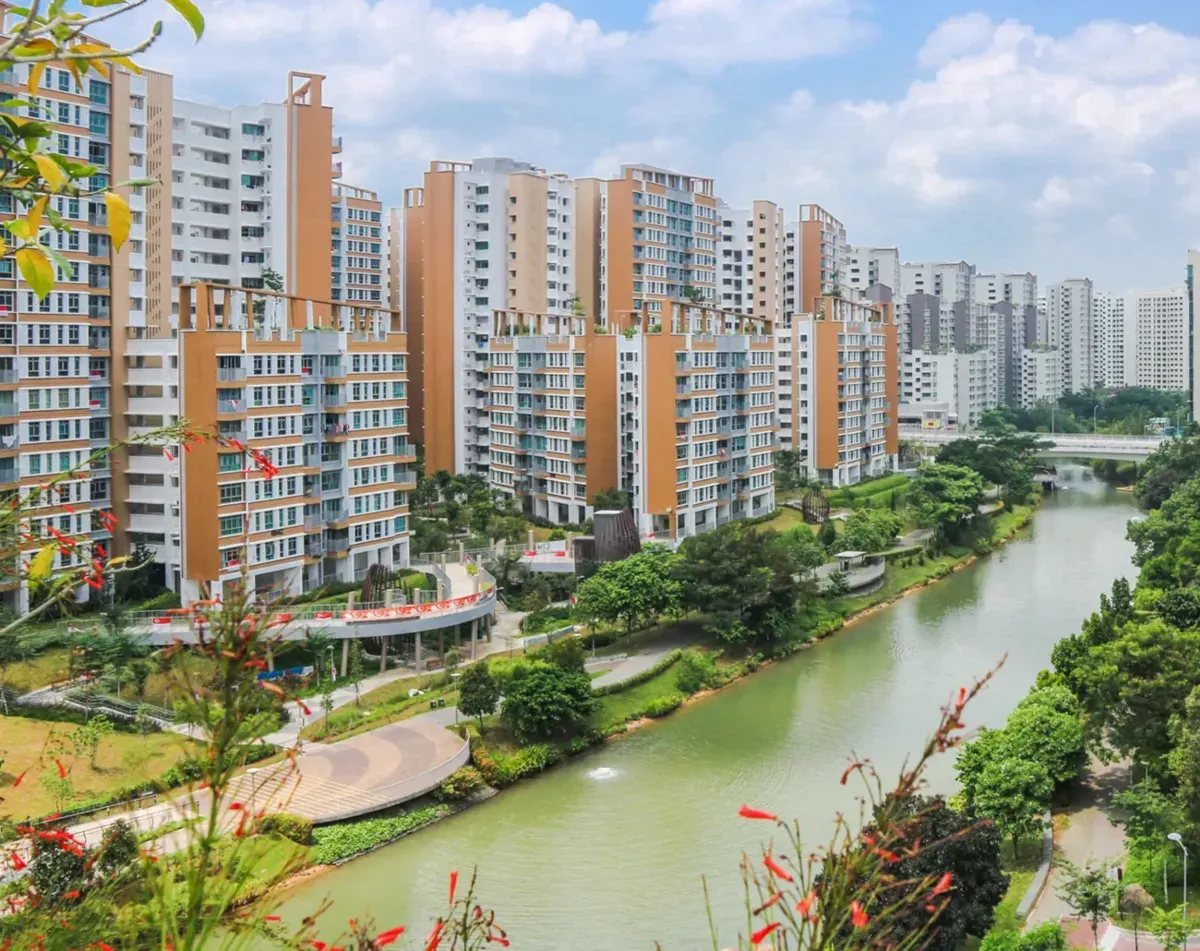HDB blocks along a landscaped waterway